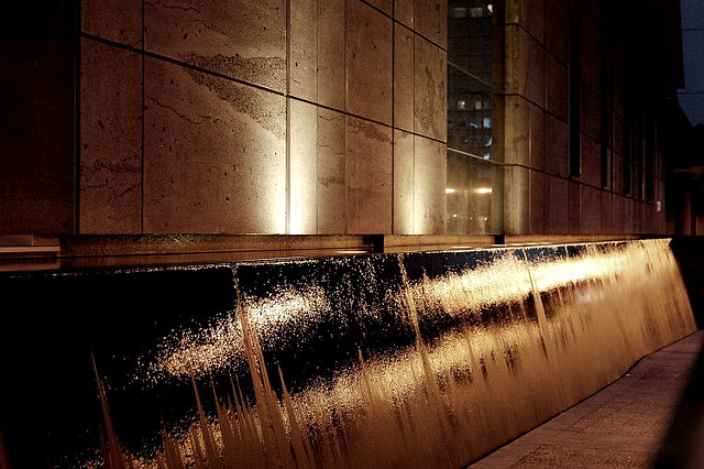 Waterfall in Christchurch at night on Flickr. I always liked this shot. Taken at night as we walked through Christchurch, I like how the water looks like oil or some other substance...anything but water.